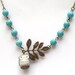 Antiqued Brass Leaf Turquoise Porcelain Owl Necklace