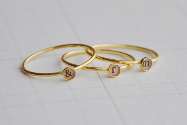 Set of three lowercase initial rings , 18k goldplated