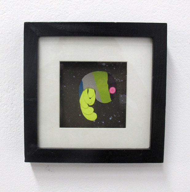 Squid In a Shell, 6"x6", framed collage