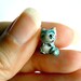 Tiny Cheshire cat - in blue and grey