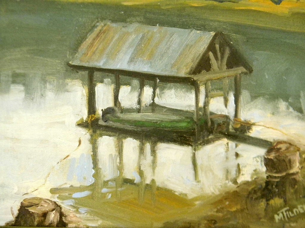 vintage oil painting, matted and framed painting of boathouse on a lake