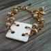Cream Bracelet - Fleur de Lis Charm - Gold Bracelet - Double Strand Jewellery - Square - Modern - Avant Garde Funky B-66