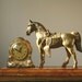 Carnival prize horse and clock, gold carnival prize horse