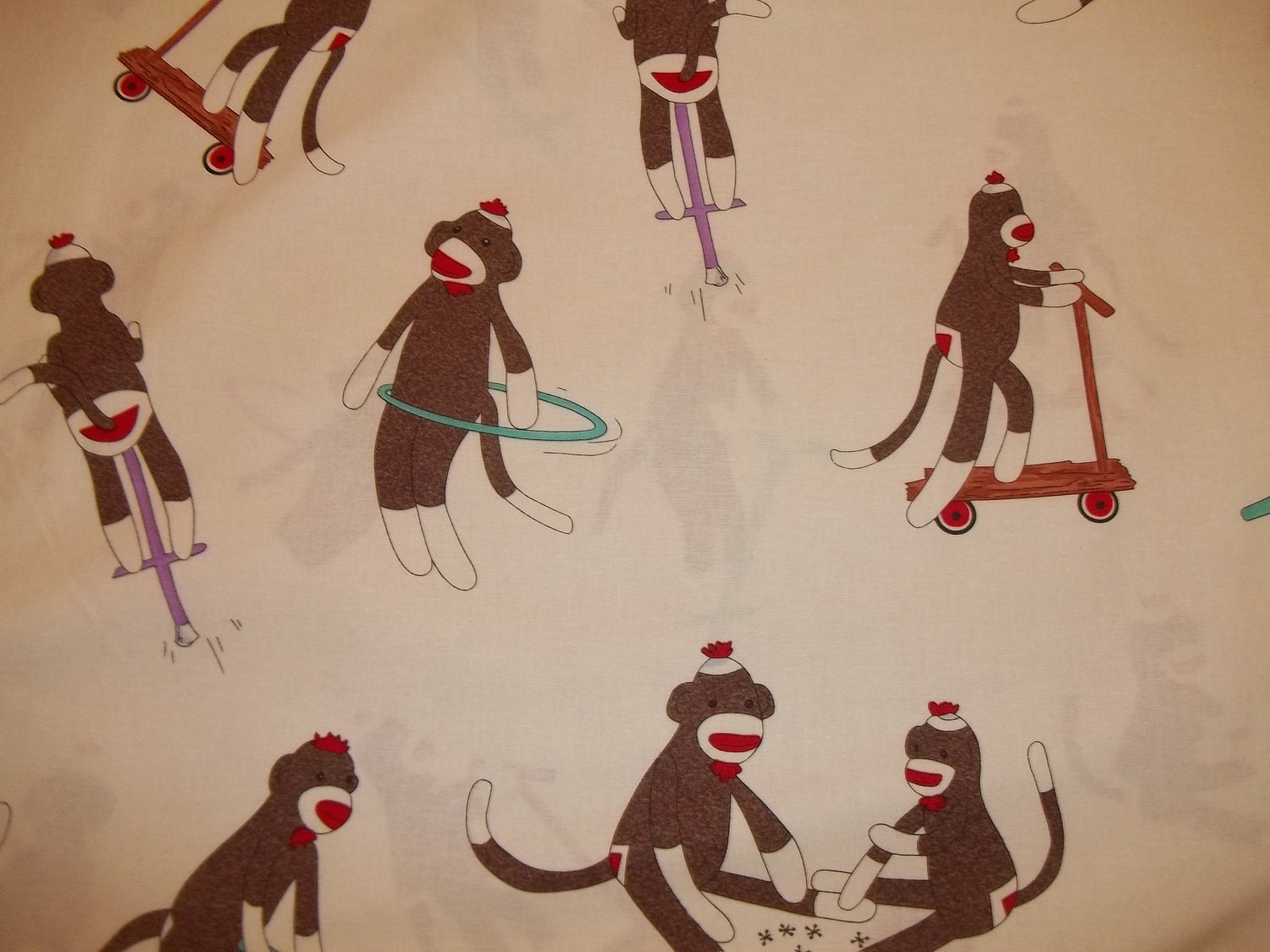 Sock Funky Monkey playing around on cream back ground by Erin michael for 5 Funky Monkey Moda Collection  OOP 1 yard cotton quilt fabric
