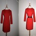 Timeless Carolina Herrera Red Wool Dress with Long Sleeves and Exaggerated Neckline