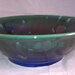 Large electic blue and emerald green bowl with glaze crystals