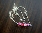 Sterling silver necklace, pink beaded centre by 21W Jewelry