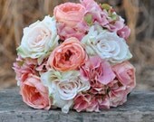 Coral rose, blush rose and pink hydrangea wedding bouquet made of silk roses.