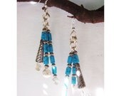 Earrings with Turquoise beads and silver wire swirls