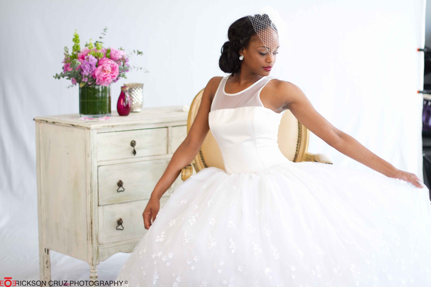 Delightful white wedding gown with silk satin bodice, floral English net and illusion illusion neckline