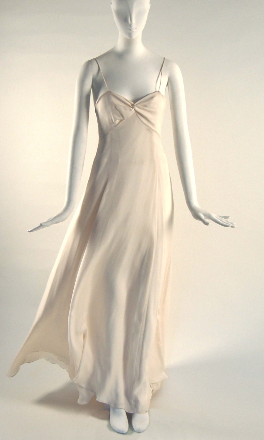 Ivory/White silk georgette classic wedding gown with twisted knot decolletage and back