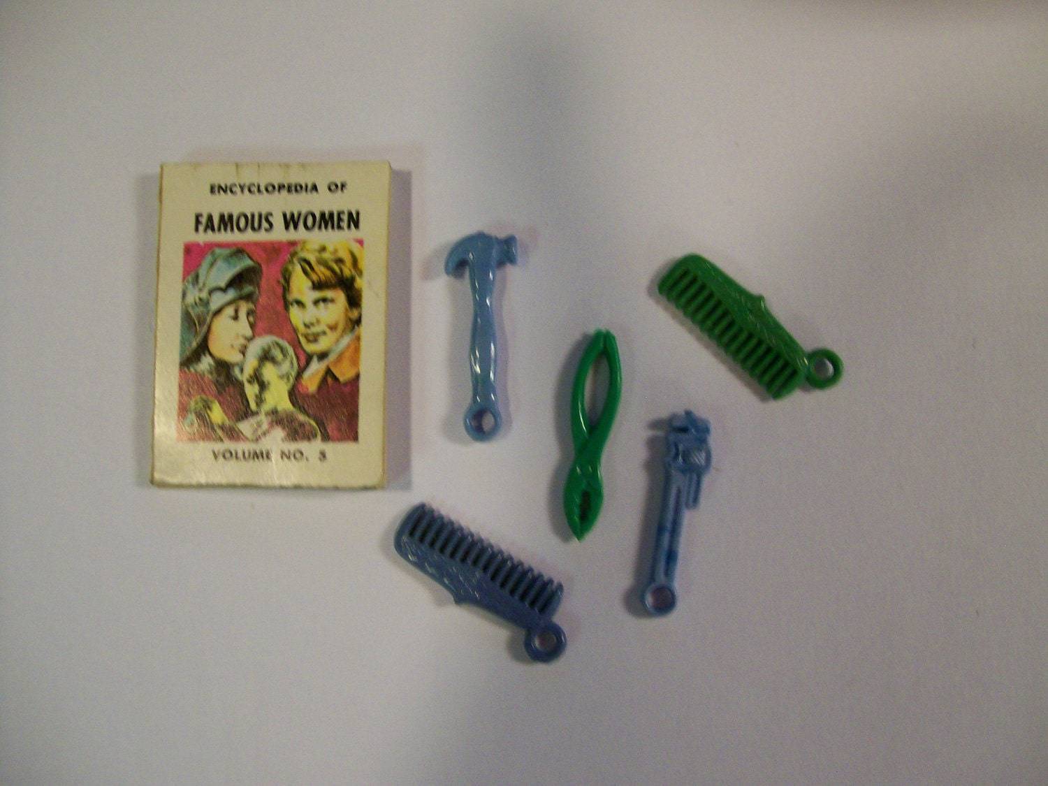 Items similar to Vintage CRACKER Jack Prizes Toys 1960s Combs, Tools, Book 6 in All on Etsy