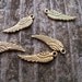 Antiqued Gold Small Wing Charms 17mm 24 pcs