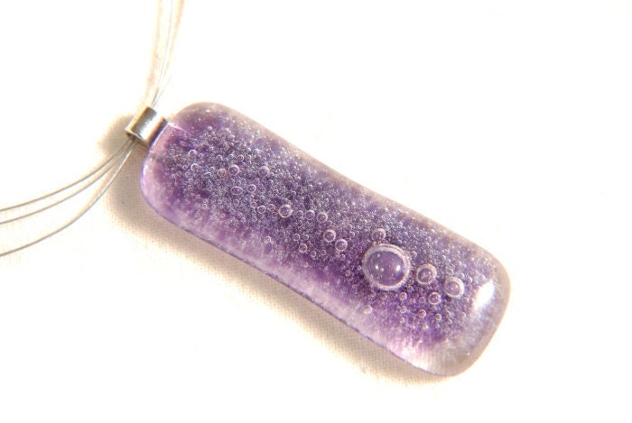 Fused glass necklace full of bubbles in gold purple
