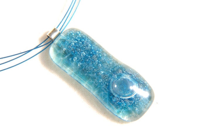 Fused glass necklace full of bubbles in aquamarine blue