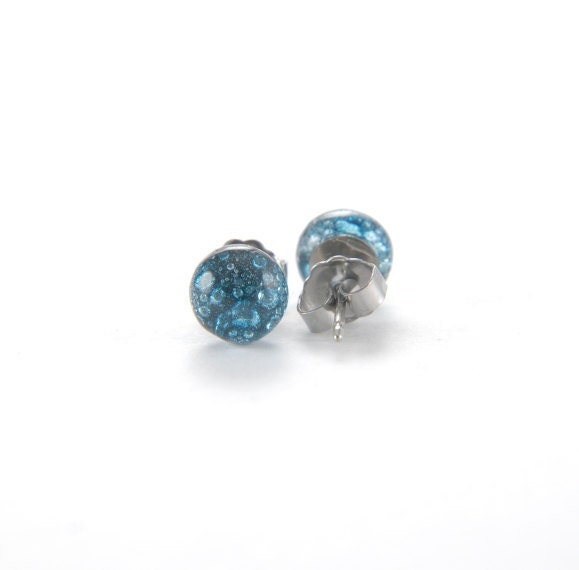Turquoise blue fused glass stud earrings full of tiny bubbles with surgical steel posts