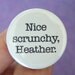 nice scrunchy, Heather. 1.25 inch pinback button. You think 1980s, you think giant hair ties. Naturally.