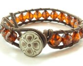 Beaded leather wrap bracelet, tangerine orange, on distressed leather, rustic look, wear alone or stacked with others.