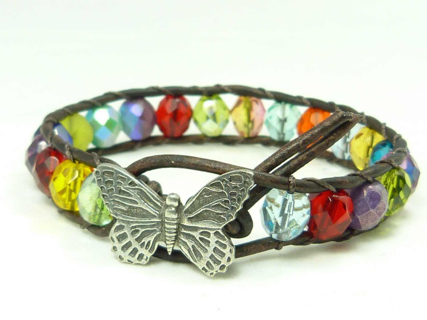 Beaded leather wrap bracelet,  multicolor with butterfly on distressed dark brown leather, single wrap bracelet.