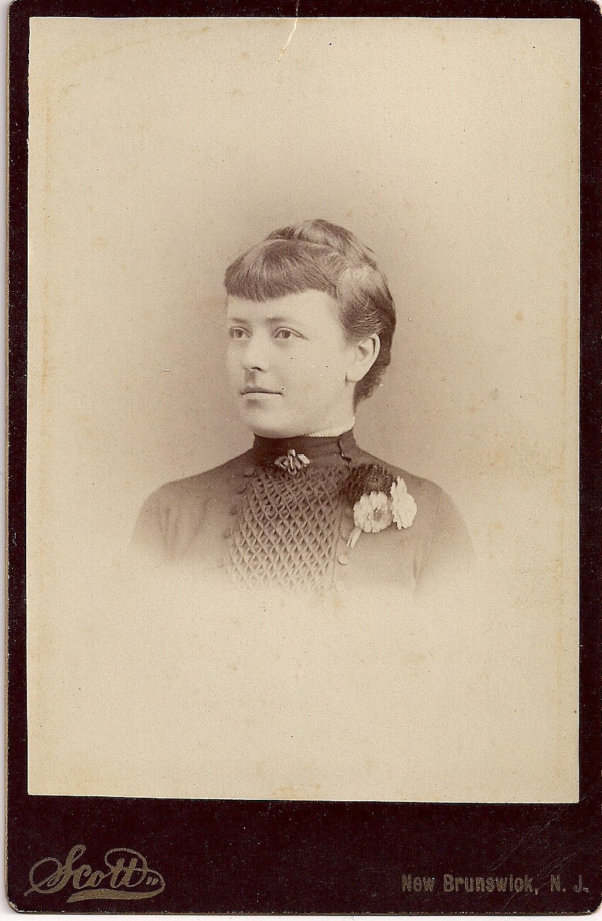 Vintage/ Antique Cabinet Photo of a Woman with short bangs fringe