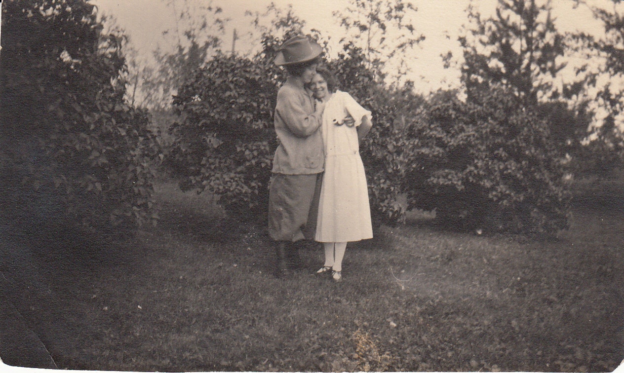 Vintage/ Antique Photo of  women in a dress and an oversized costume