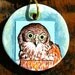 Owl Pendant. Hand painted and digital art. Green and Orange. Wood and waxed cotton.