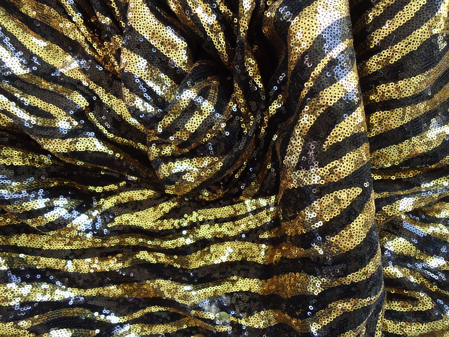 black and gold Zebra sequin fabric by Marziani on Etsy
