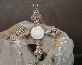Sterling Silver, Carved Coral and Orange Sapphire Cross