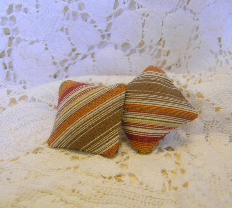 Diagonal stripe pillows in rust and brown miniatures