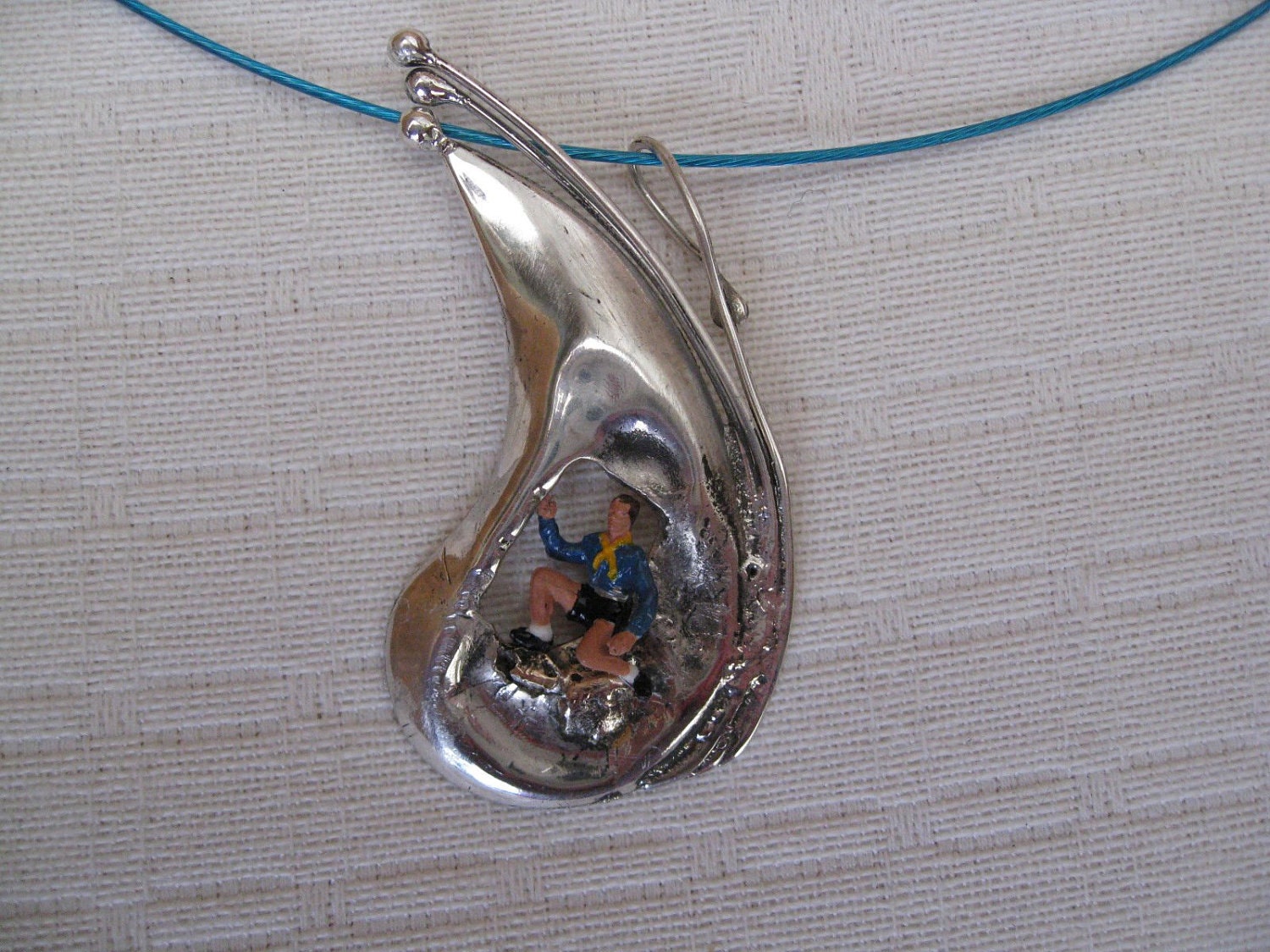 Scouting pendant, silver , from the tiny people line