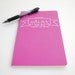 Idea Notebook with Banner and Modern Calligraphy . Large Moleskine Volant . Hot Pink . Amazing Ideas That Will Change the World
