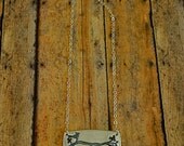 Fine Silver and Garnet Bird on a Branch Necklace