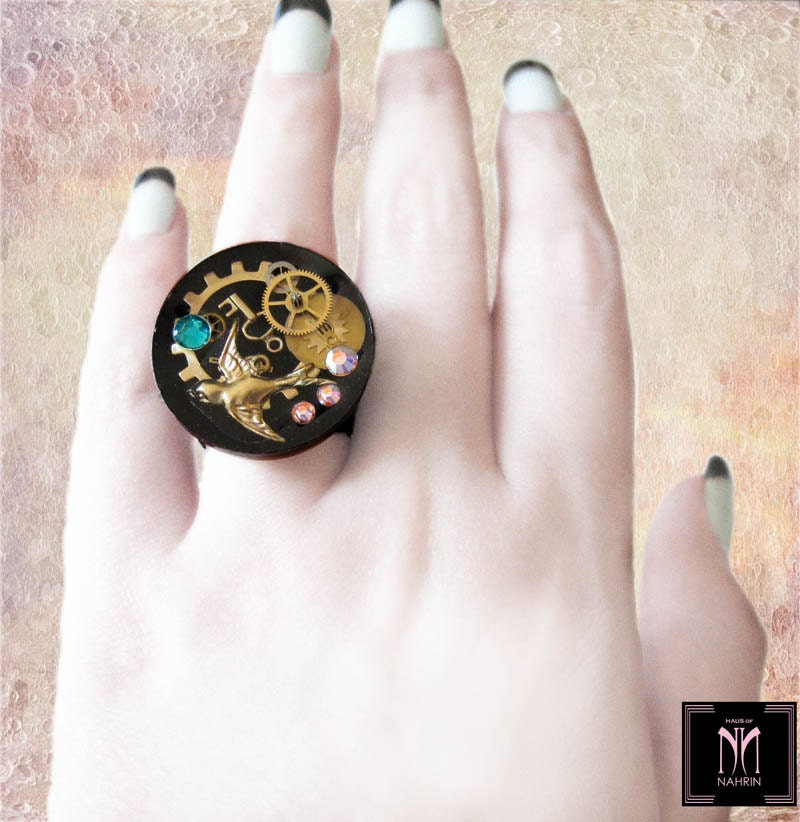 Crystal Steampunk Ring with Gears and Charms Layered in Resin
