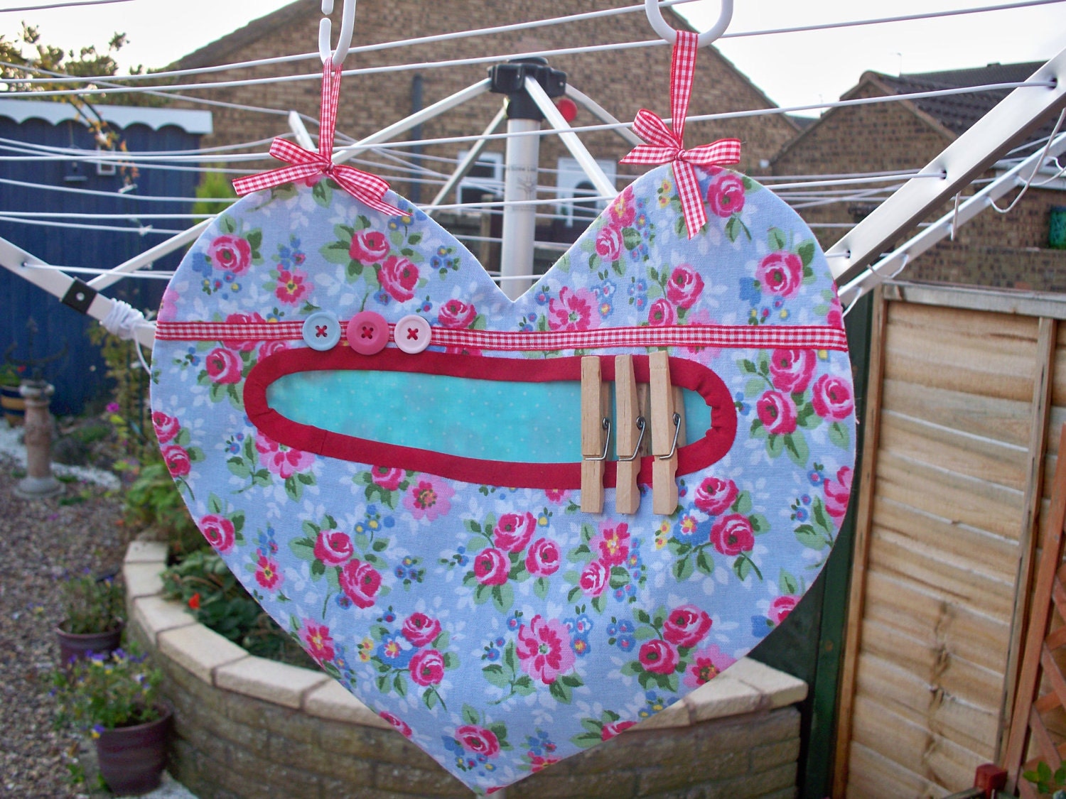 Clothespin / peg bag in cute heart shape, blue flowery fabric with button detail, flowers, spring, springtime, worldwide shipping