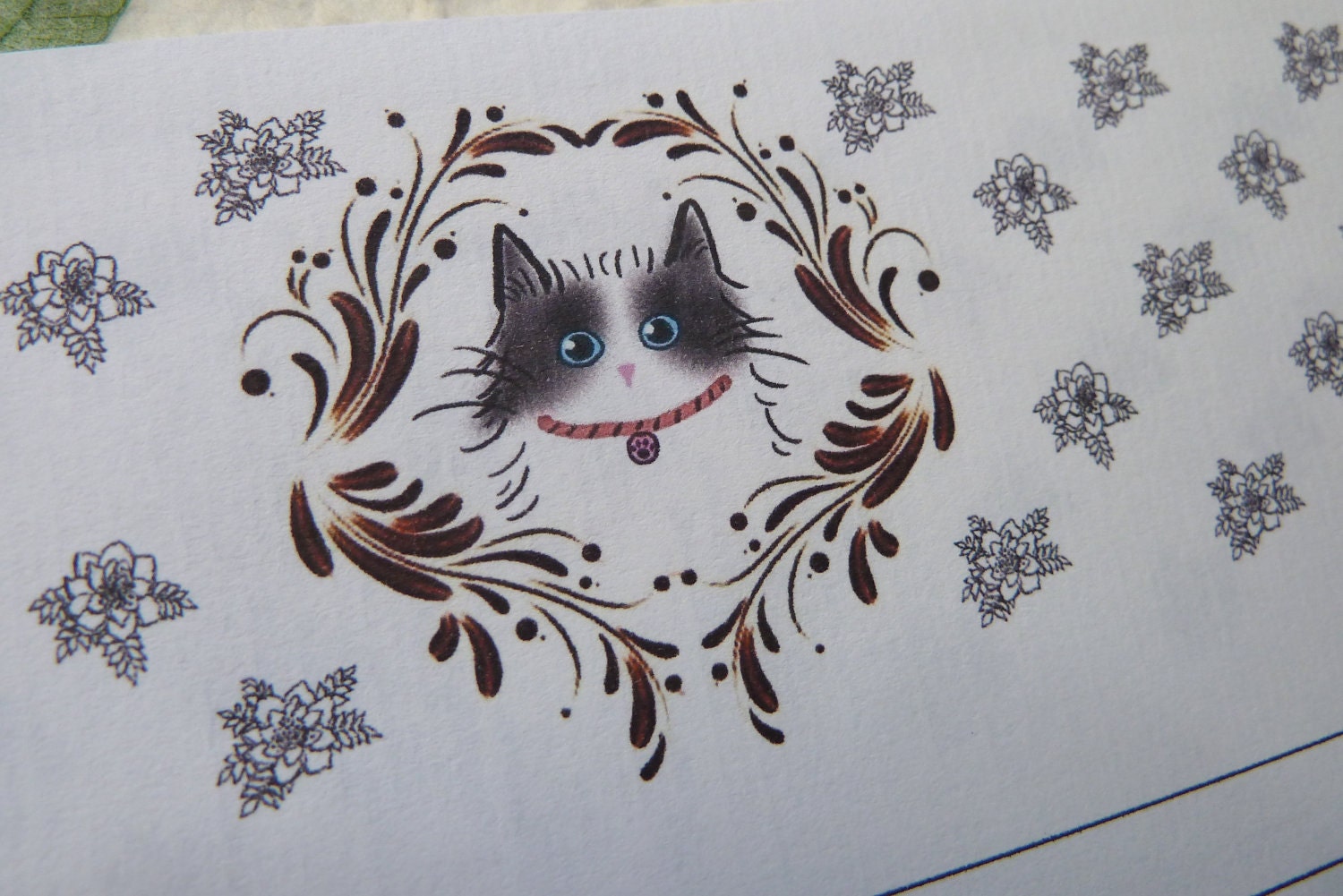 letter-paper / Ragdoll Cat