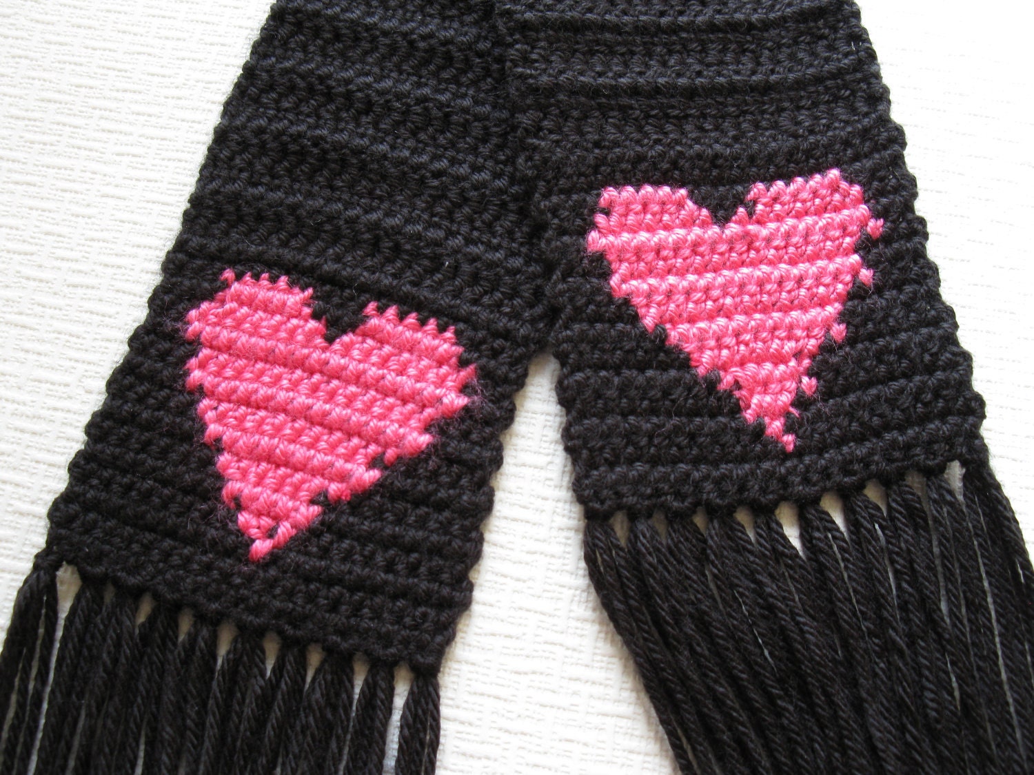 Long black scarf with bright pink hearts for women.