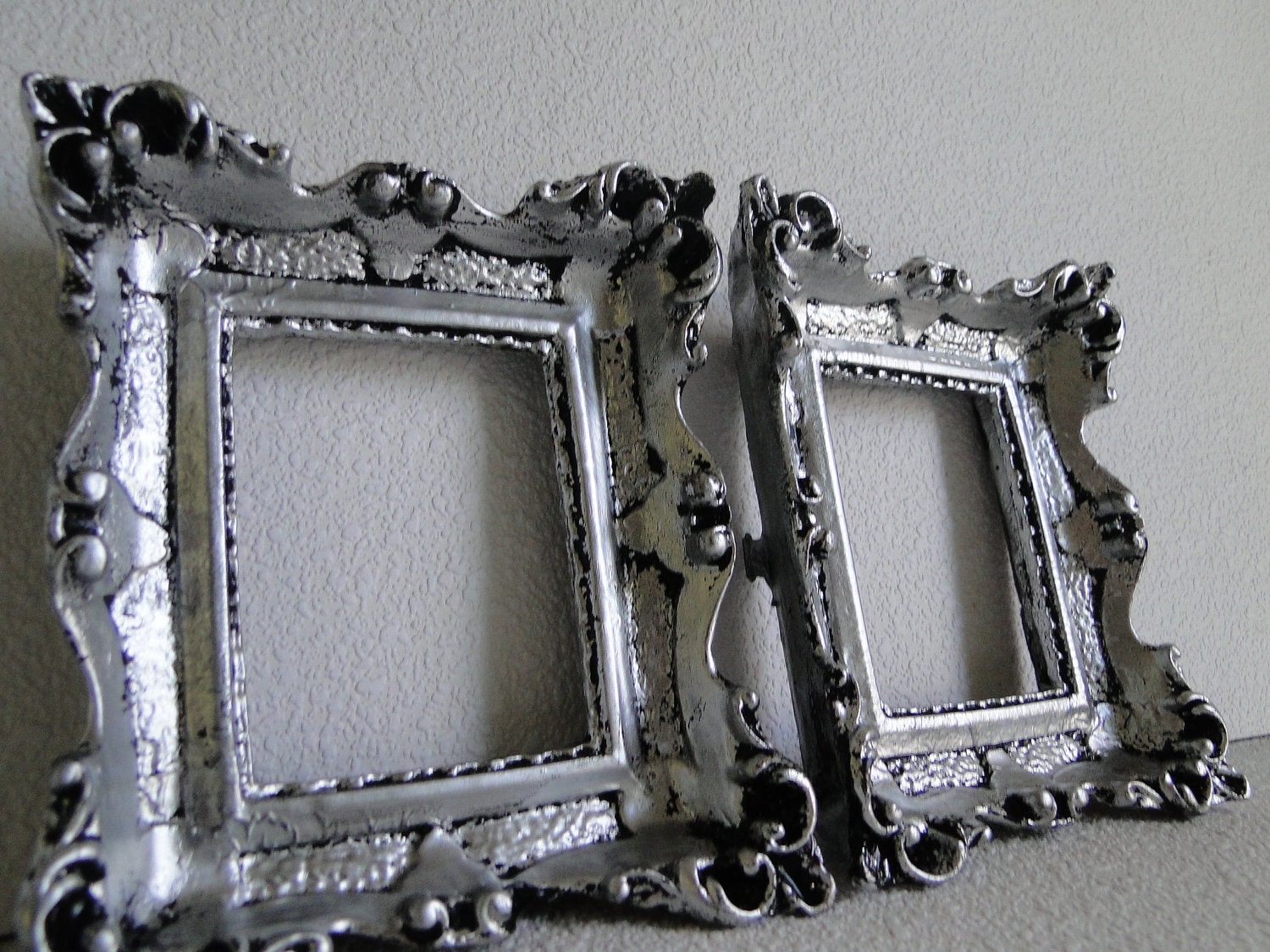Pair of Tiny Vintage Ornate Mirrors in Silver with a Black Patine Hollywood Regency Paris Apartment French Country "Ice"