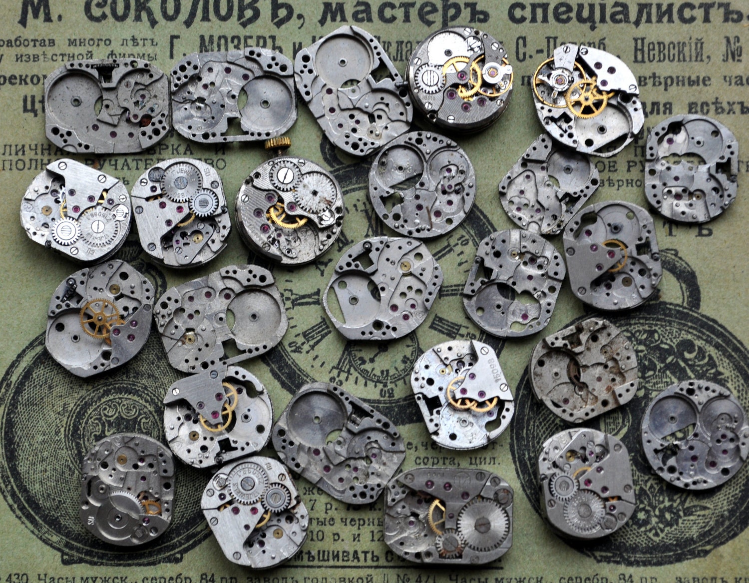 Lot of 25 vintage small watch movements.