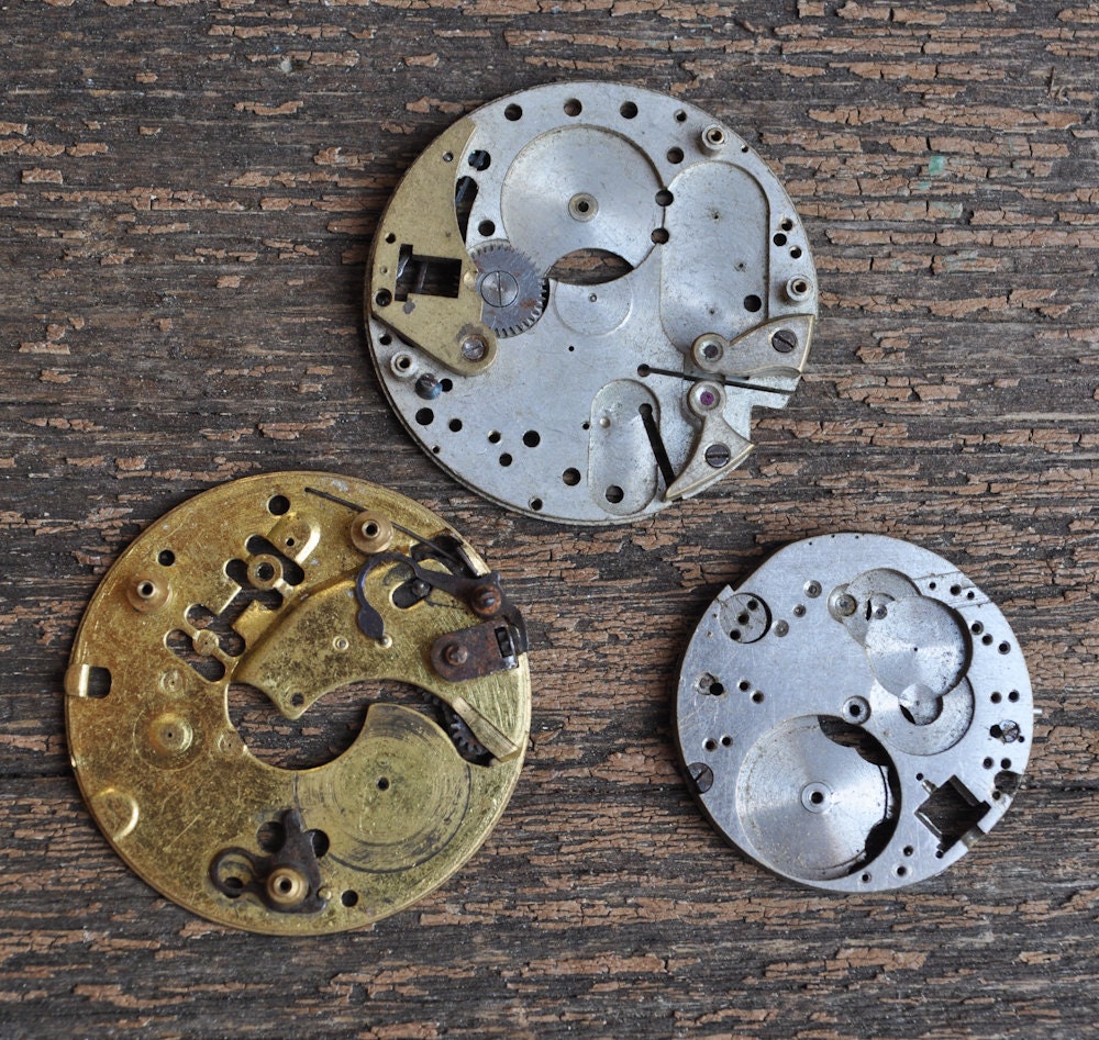Lot of 3 antique pocket watch movements.