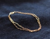 light layered chain gold bracelet