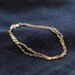 light layered chain gold bracelet