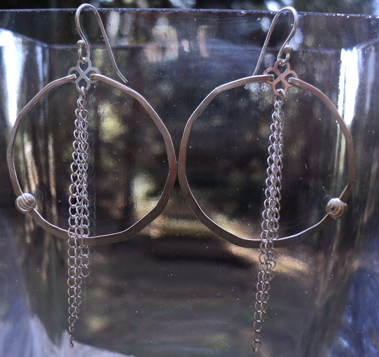 Sterling silver hoop, hand-hammered with hanging chains. Medium sized silver hoop women's earrings.
