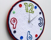 Crochet wall clock with surface embroidered numbers and buttons
