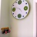 Large crochet wall clock in shades of green - 45cm diameter