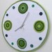 Large crochet wall clock in shades of green - 45cm diameter