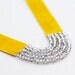 STEER necklace in mustard yellow velvet adorned with silver fire polished rondelle beads