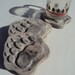 Cast Cement Stone Bear Paw Coasters Set Of Four