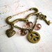 Steampunk peace symbol. Vintage brooch Bronze Key Peace Heart Plum swarowski beads Safety pin brooch