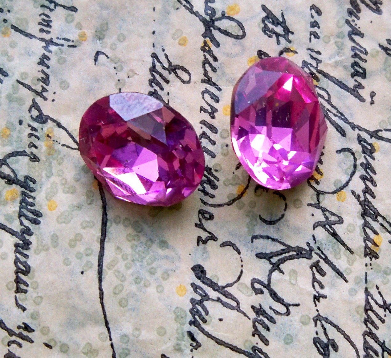 Two 12 X 10mm oval Swarovski crystals, Rose