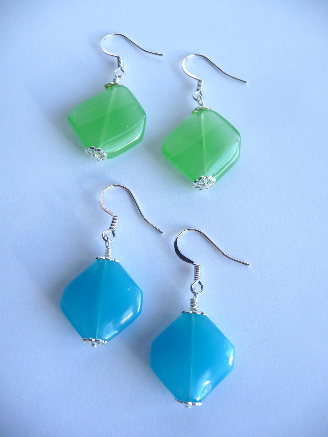 Two pairs of earrings blue and green
